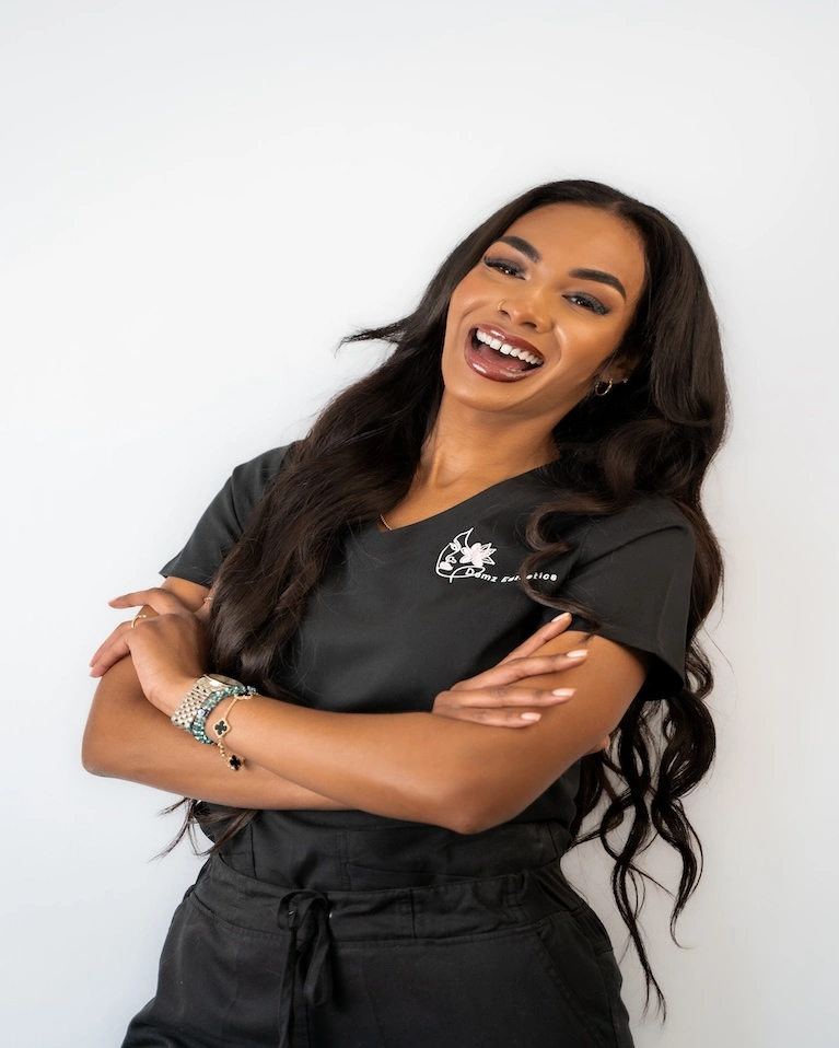 Portrait headshot of our main team member and Founder of Demzesthetics, Demi.